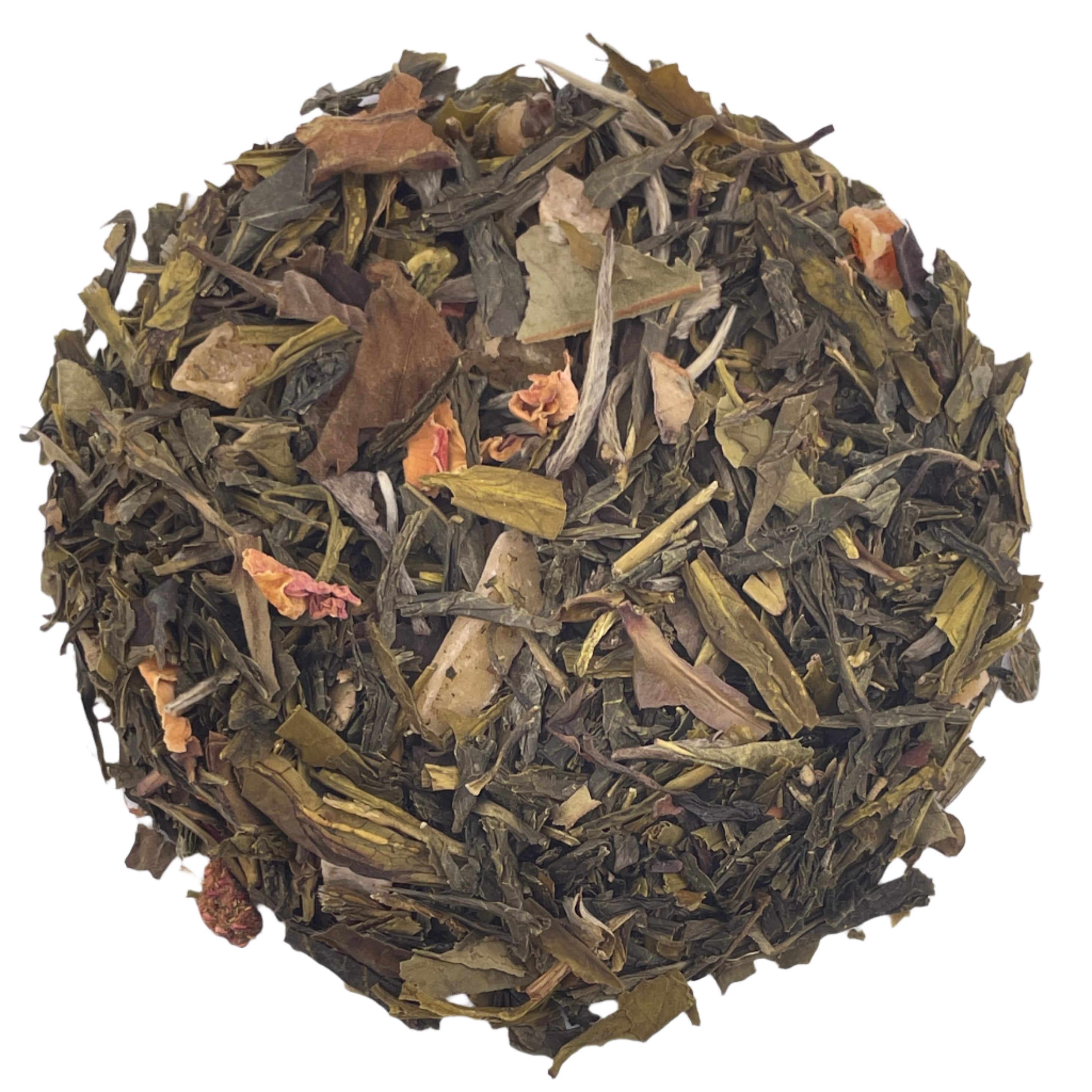 Dry green tea leaves on a white surface