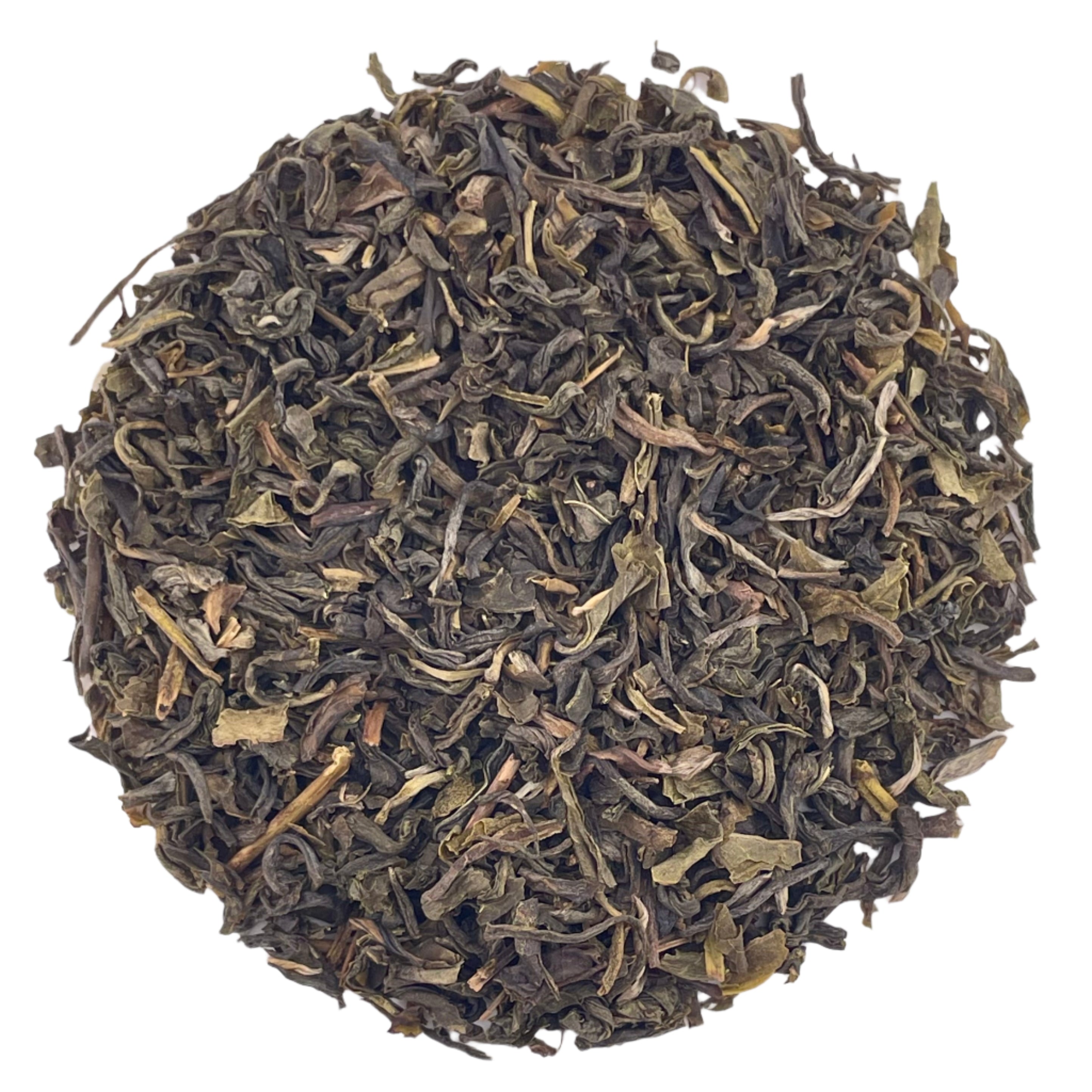 Dry green tea leaves on a white background