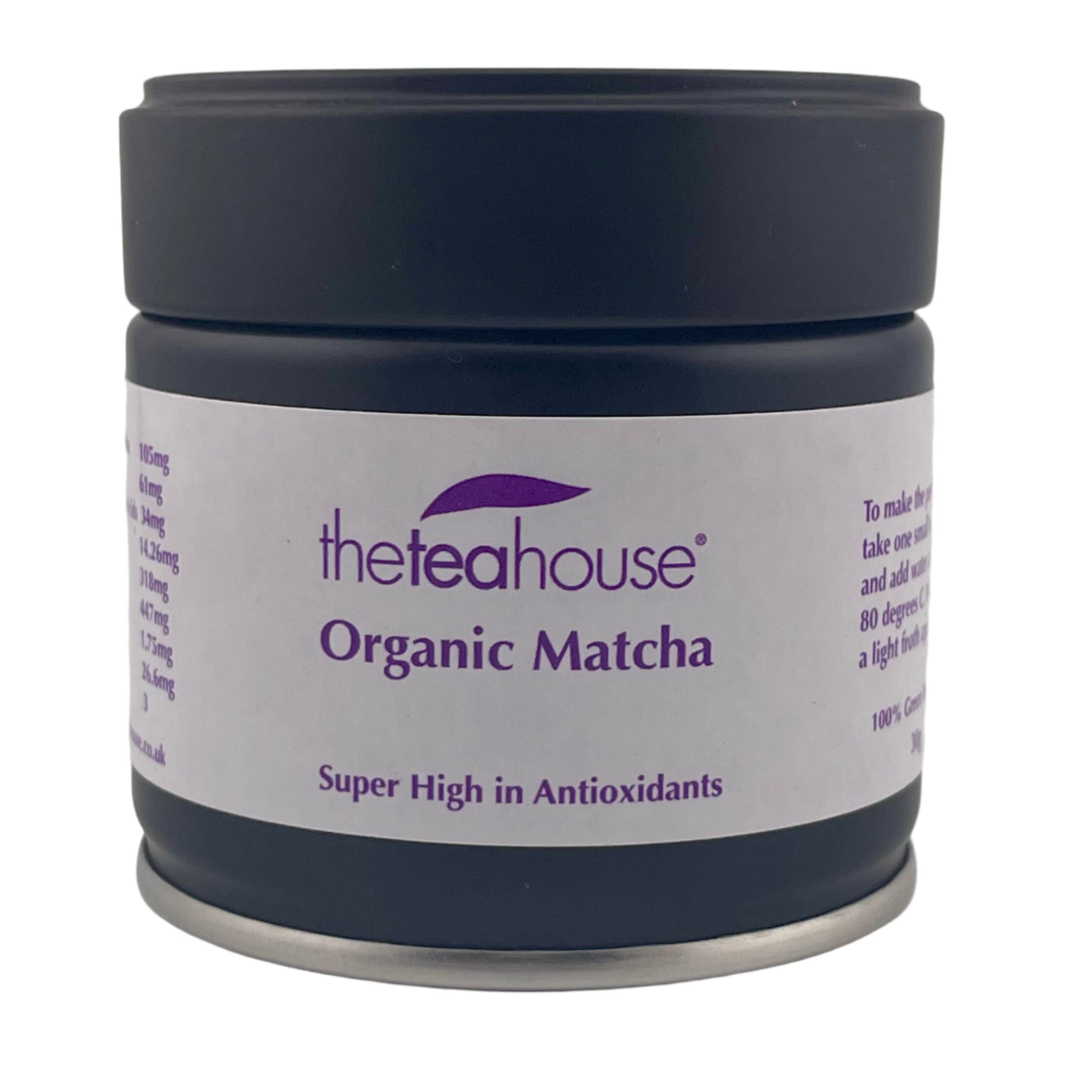 tin of organic matcha on a white background