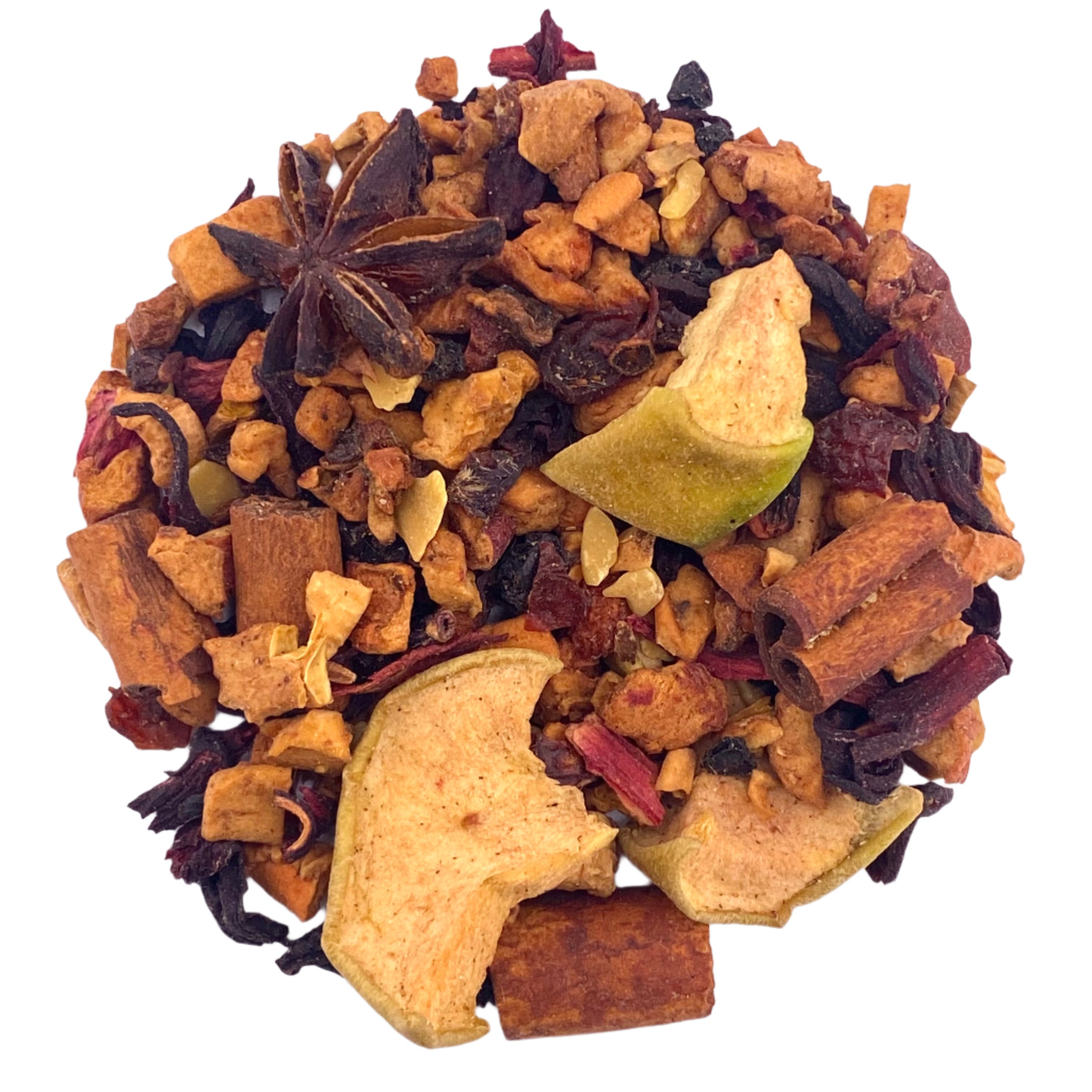Assorted dried fruits and spices on a white background