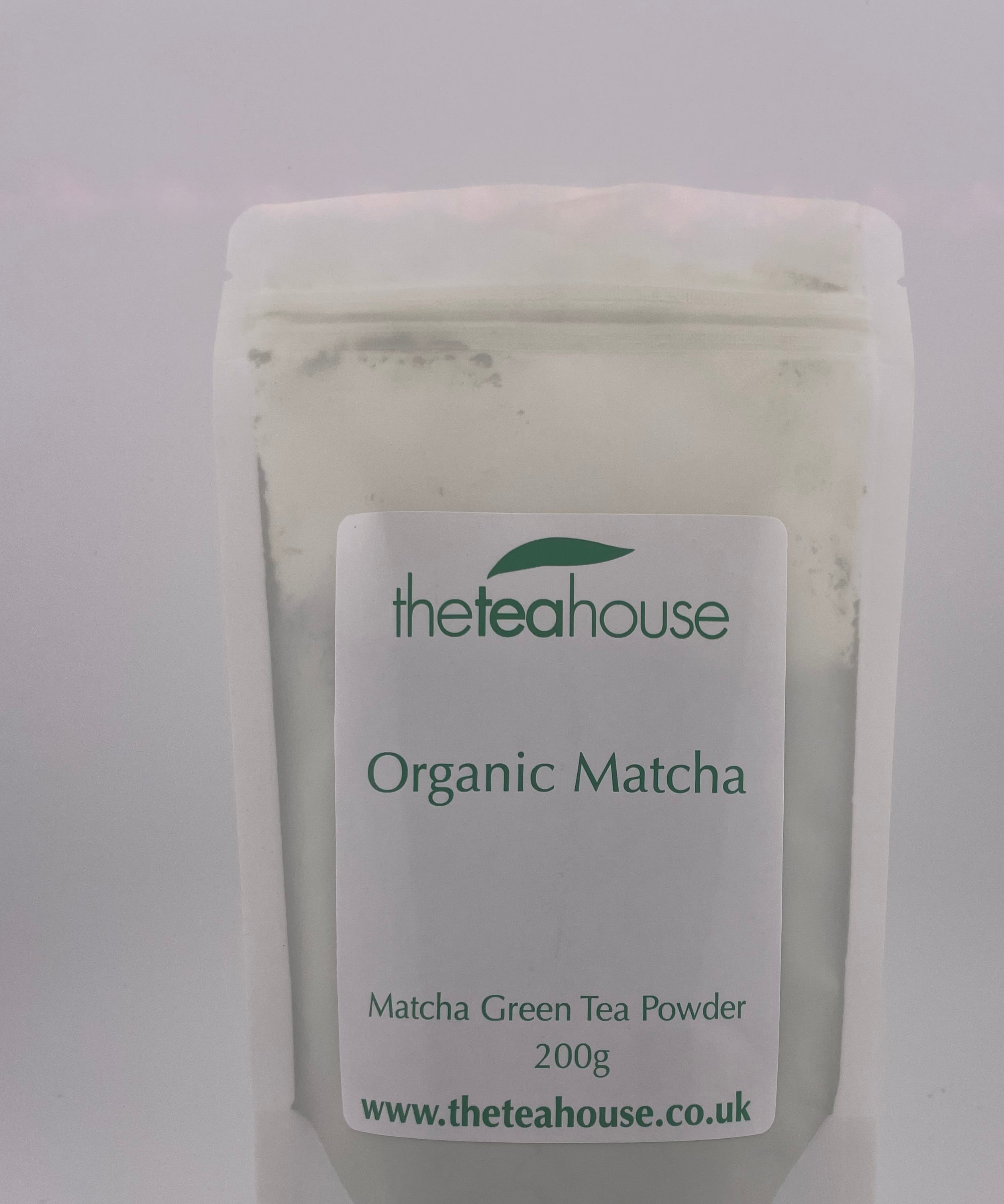 Theaahouse Organic Matcha green tea powder packaging on a white background